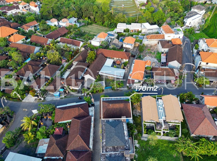 "A 170m² plot on Babakan Canggu’s main street, once a restaurant, is perfect for building villas, bars, or restaurants. Just 10 minutes from Batu Bolong Beach, it's in a busy tourist area."
