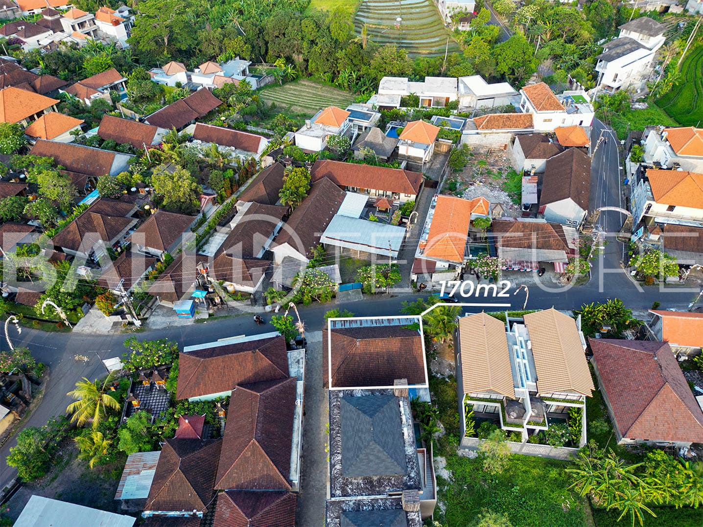 "A 170m² plot on Babakan Canggu’s main street, once a restaurant, is perfect for building villas, bars, or restaurants. Just 10 minutes from Batu Bolong Beach, it's in a busy tourist area."
