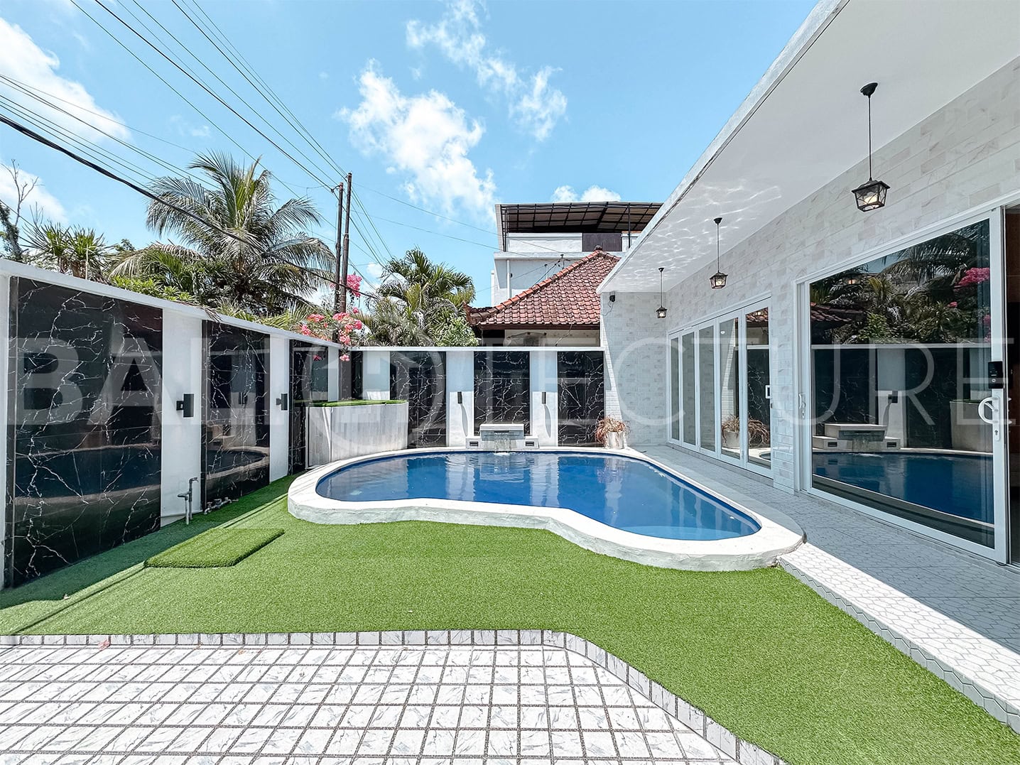 "Semi-furnished Ungasan villa with freehold ownership, close to popular Bali destinations."
