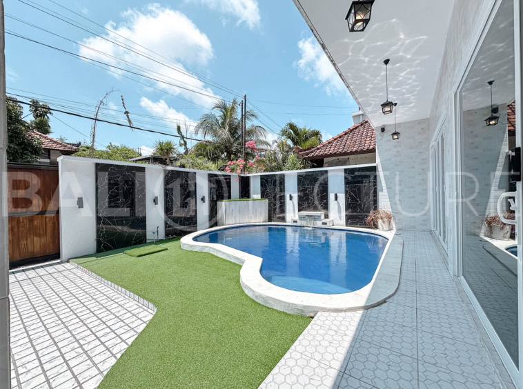 "Semi-furnished Ungasan villa with freehold ownership, close to popular Bali destinations."