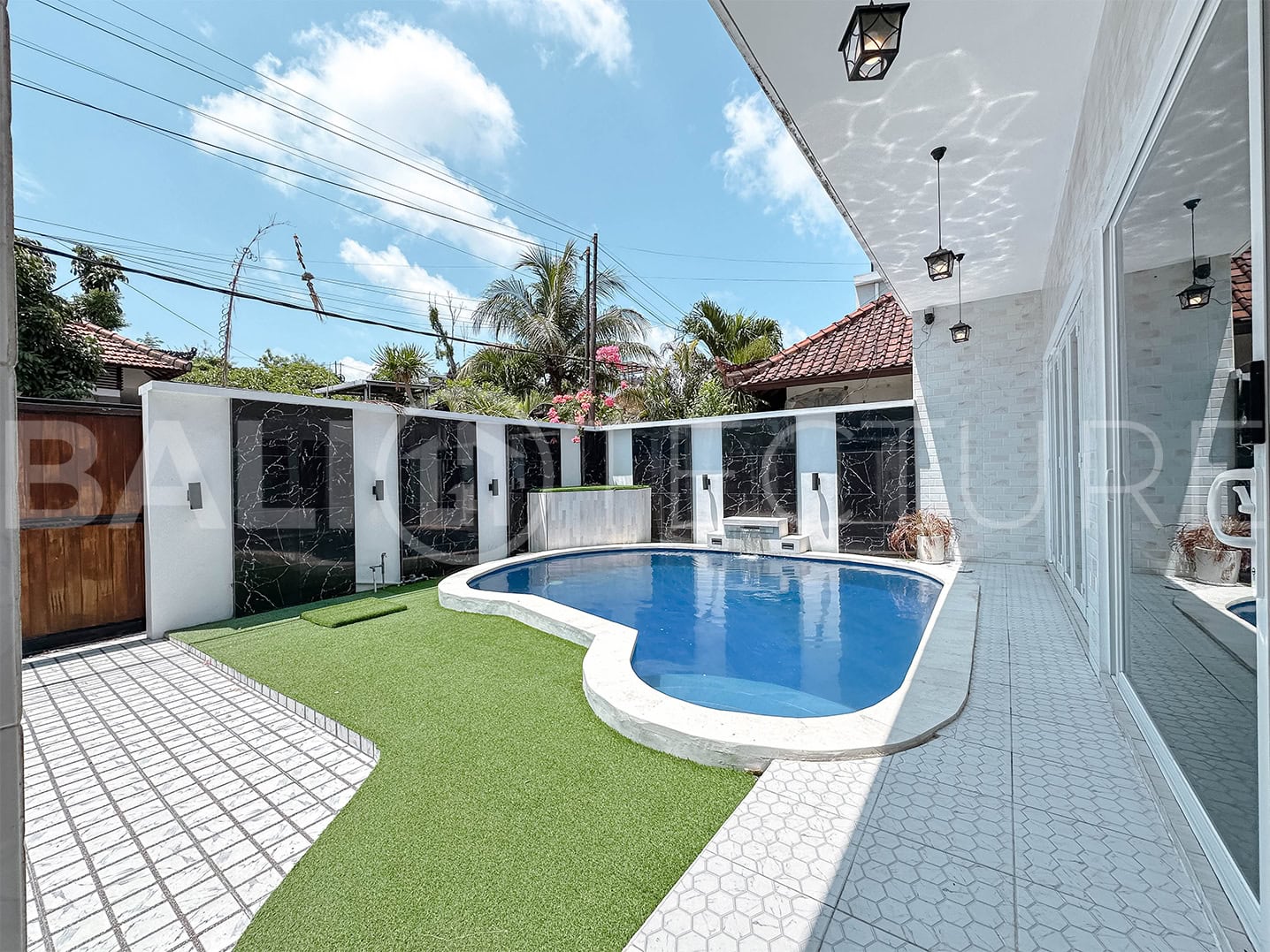 "Semi-furnished Ungasan villa with freehold ownership, close to popular Bali destinations."
