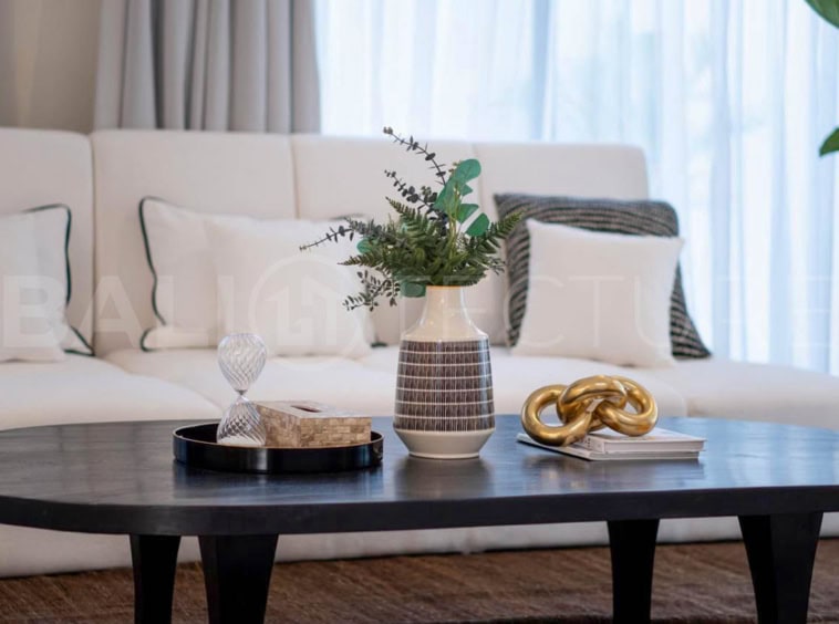 "Elegant 4-bedroom villa on a 500m² plot with ensuite bathrooms and stylish design."