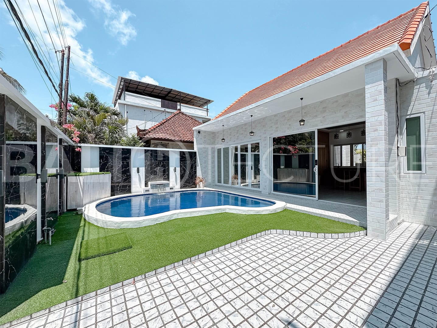 "Semi-furnished Ungasan villa with freehold ownership, close to popular Bali destinations."