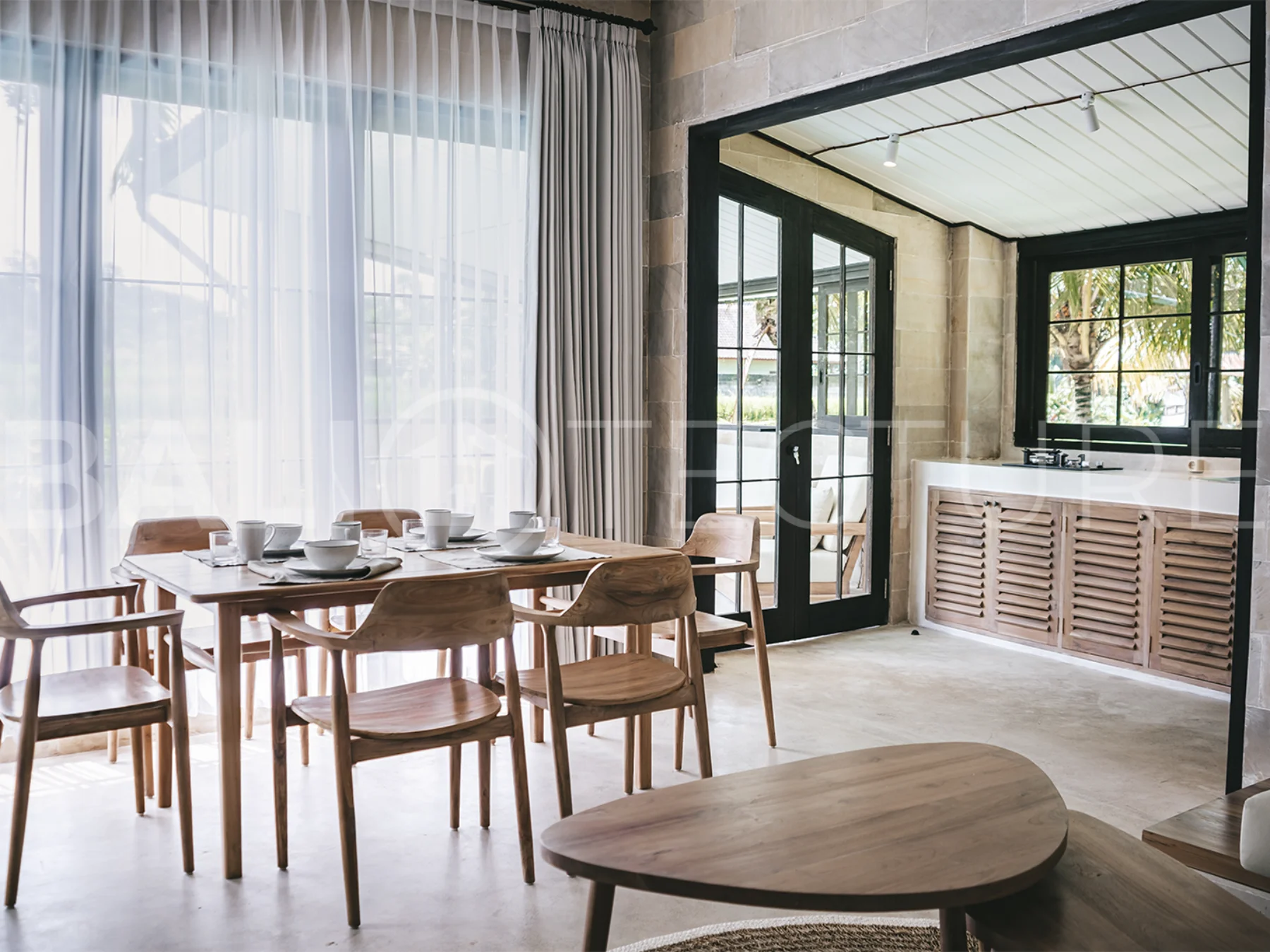 Front view of a modern 4-bedroom villa with a private pool in Ubud, Bali.