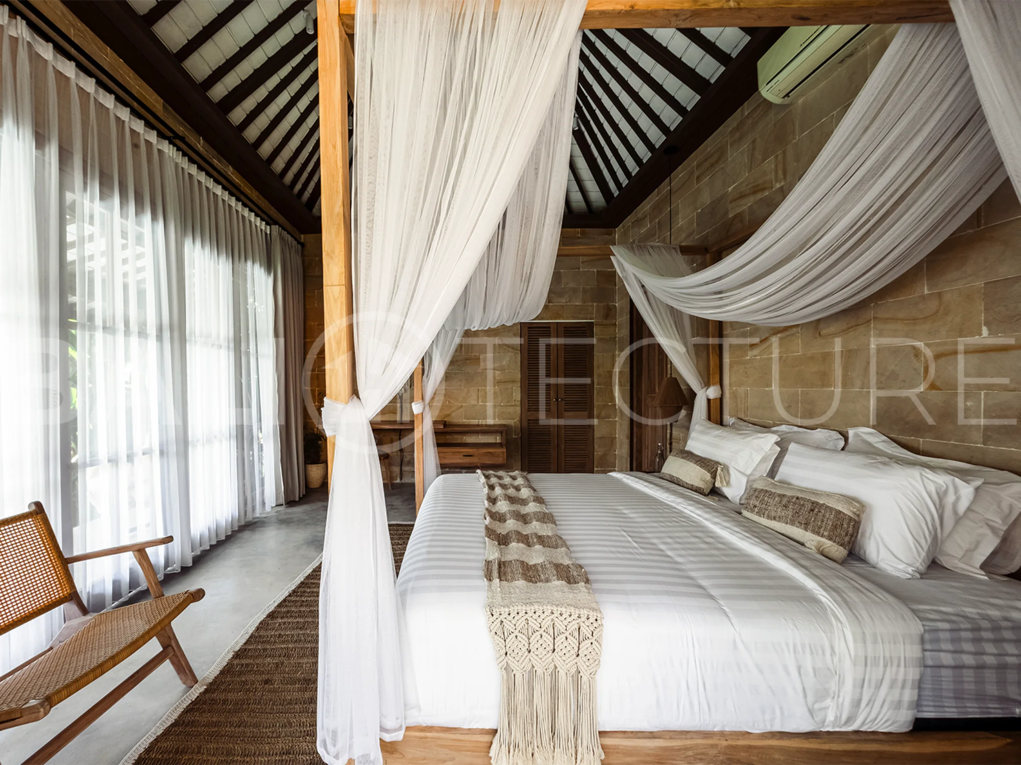Interior view of the open-plan living area in a stylish Ubud villa, blending comfort and modern aesthetics.
