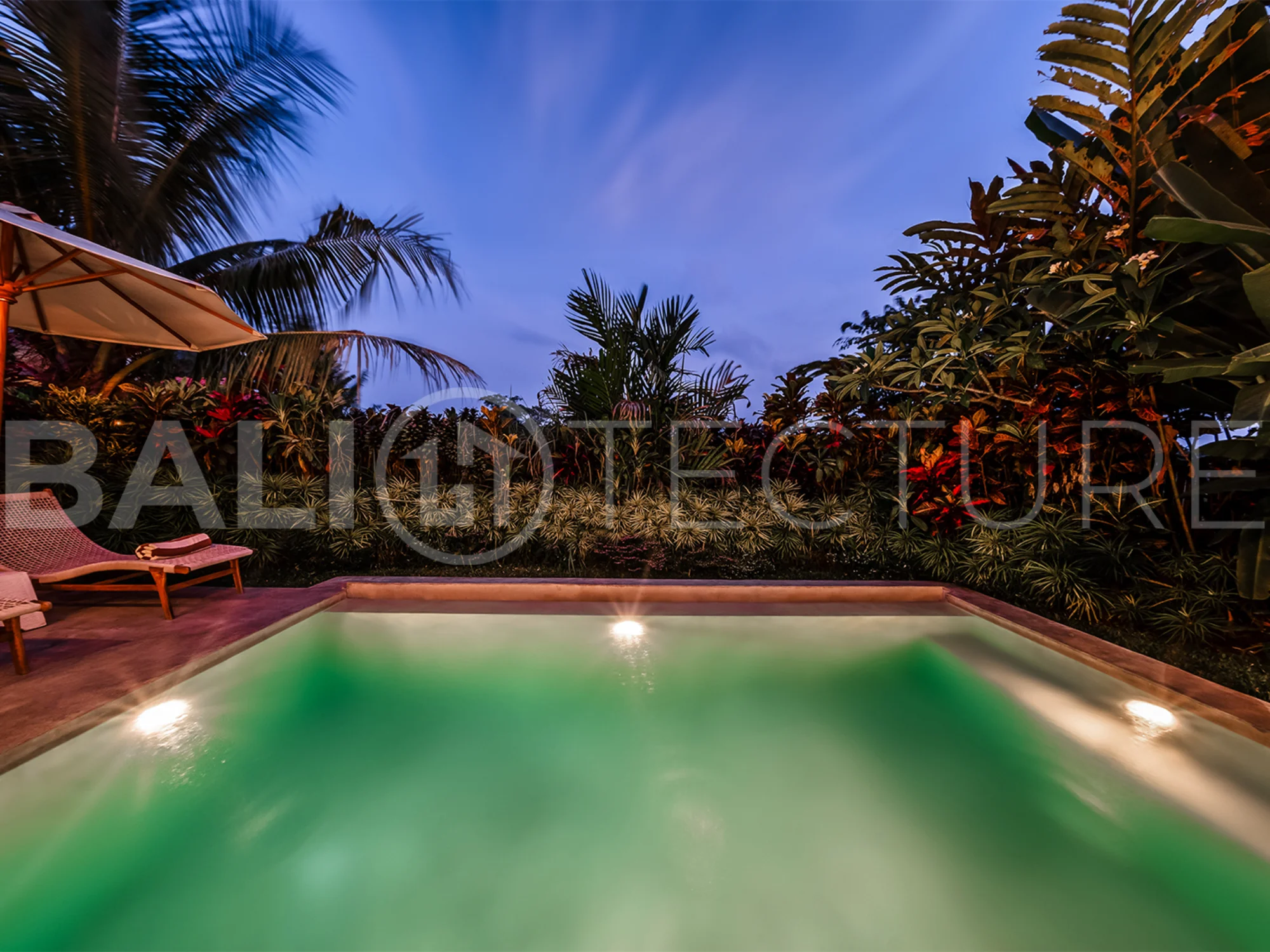 Interior view of the open-plan living area in a stylish Ubud villa, blending comfort and modern aesthetics.