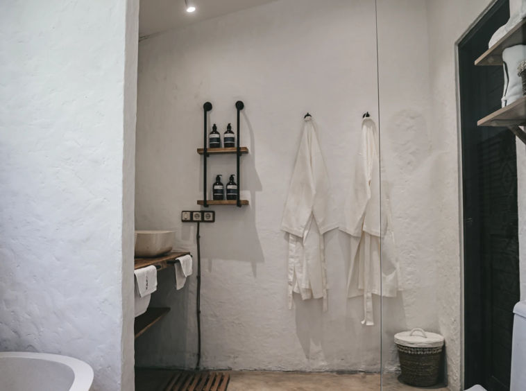 Elegant private pool surrounded by lush greenery in a tranquil Bali setting.