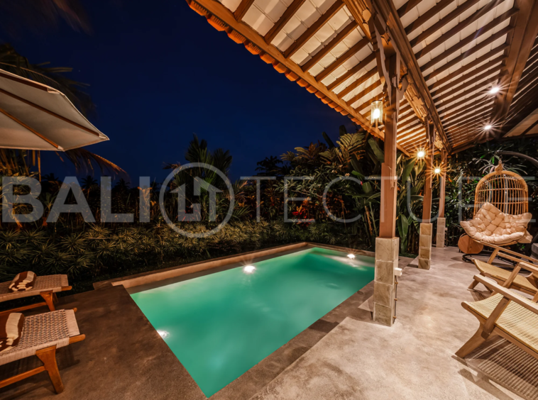 Exterior of a serene 1-bedroom villa in Ubud with a private pool and tranquil garden setting.