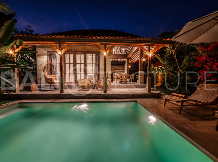 Exterior of a serene 1-bedroom villa in Ubud with a private pool and tranquil garden setting.