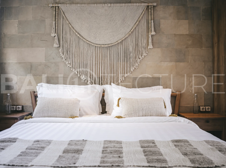 Comfortable bedroom with modern furnishings in a 4-bedroom Ubud villa.