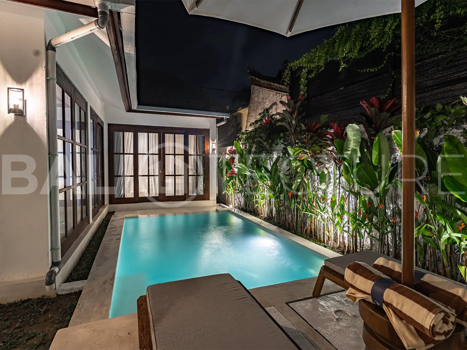 Spacious living area with contemporary design and natural light in a 2+1 layout Ubud villa.