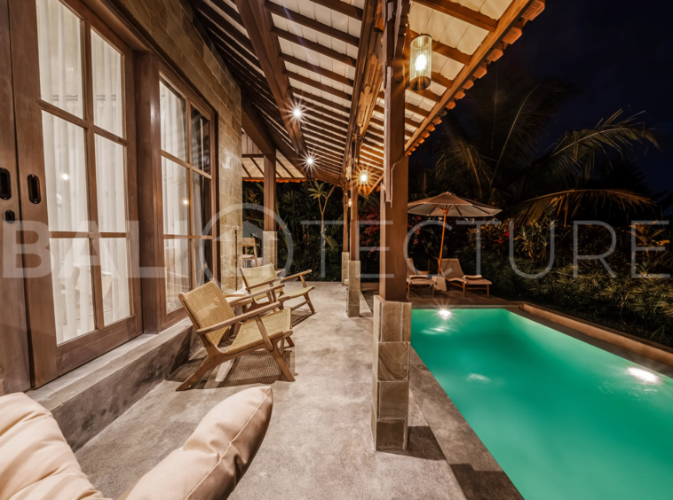 Exterior of a serene 1-bedroom villa in Ubud with a private pool and tranquil garden setting.