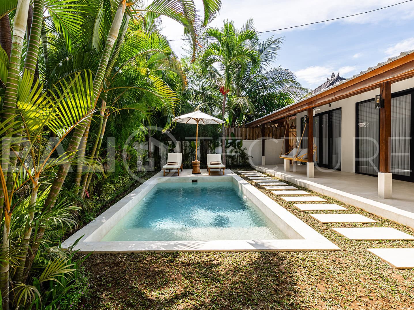 Modern 4-bedroom villa with spacious interiors and serene surroundings in Ubud.