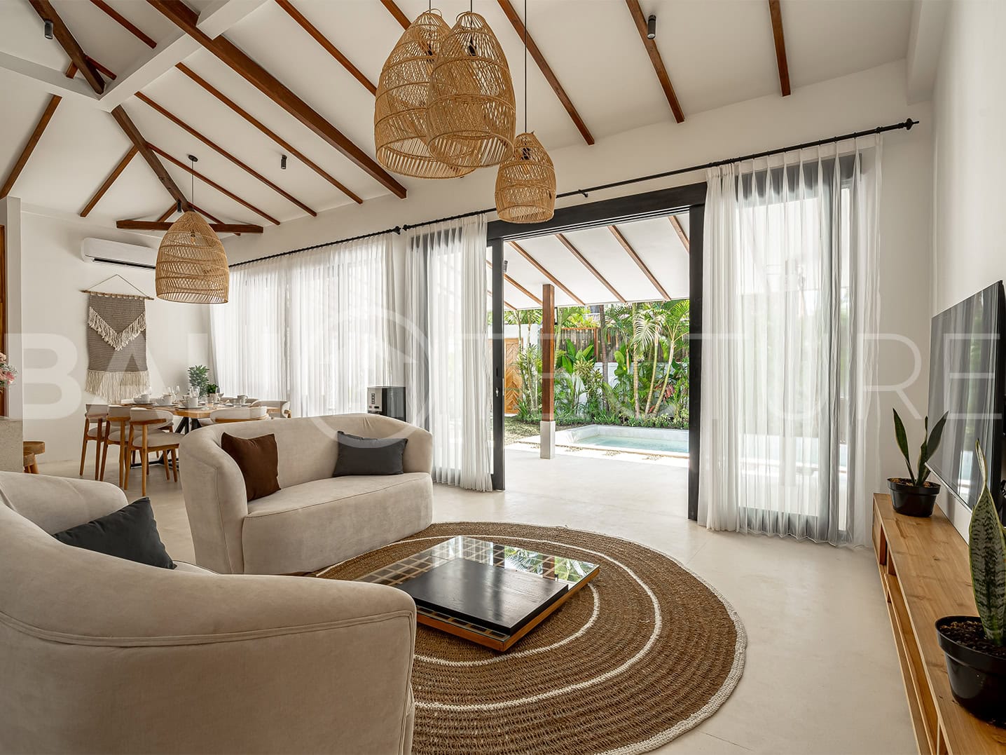 Elegant living space with a private pool, perfect for relaxation and entertaining.