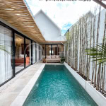 Modern 2-bedroom villa in Seminyak with private pool and open-plan living space.