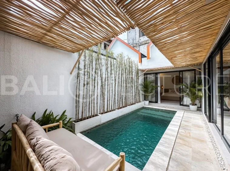 Modern 2-bedroom villa in Seminyak with private pool and open-plan living space.
