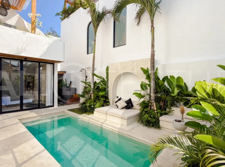 Modern tropical luxury villa at Solas Villas in Bingin, Bali, featuring contemporary architecture, stylish interiors, a private infinity pool, and a rooftop terrace with panoramic ocean views. Surrounded by lush tropical scenery, the villa offers a sophisticated coastal lifestyle with high-quality finishes and functional living spaces. Scheduled for completion in late 2025, this exclusive property is located in one of Bali's most desirable destinations and is eligible for buyer financing.