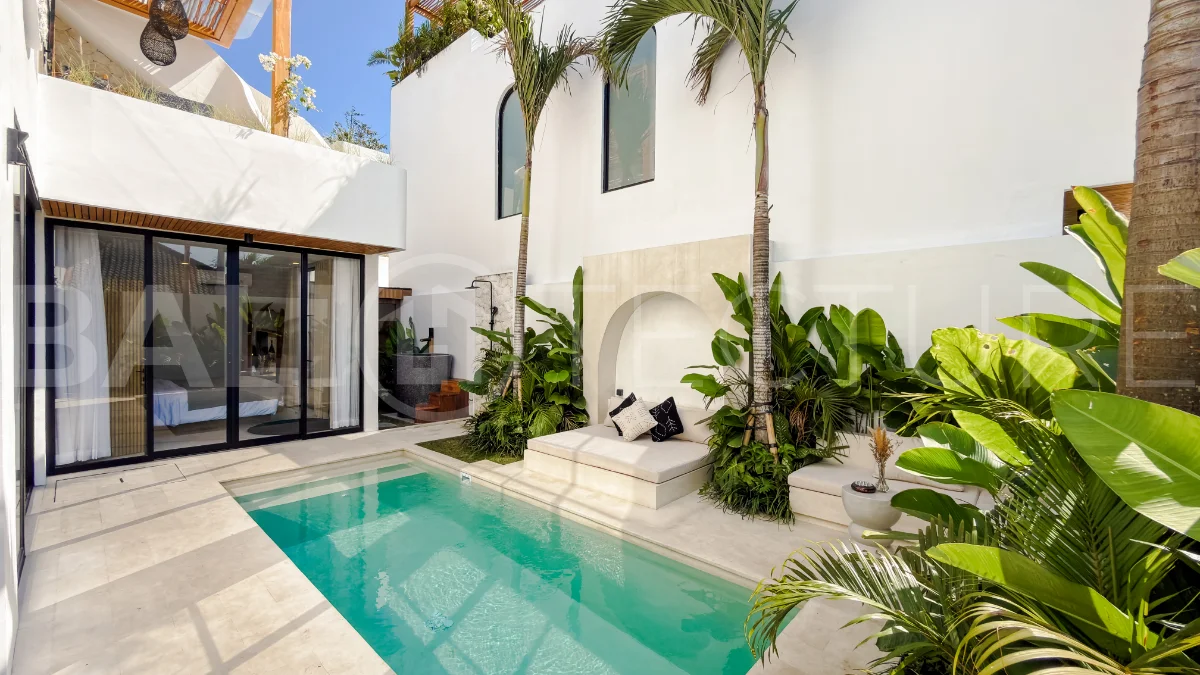 Modern tropical luxury villa at Solas Villas in Bingin, Bali, featuring contemporary architecture, stylish interiors, a private infinity pool, and a rooftop terrace with panoramic ocean views. Surrounded by lush tropical scenery, the villa offers a sophisticated coastal lifestyle with high-quality finishes and functional living spaces. Scheduled for completion in late 2025, this exclusive property is located in one of Bali's most desirable destinations and is eligible for buyer financing.