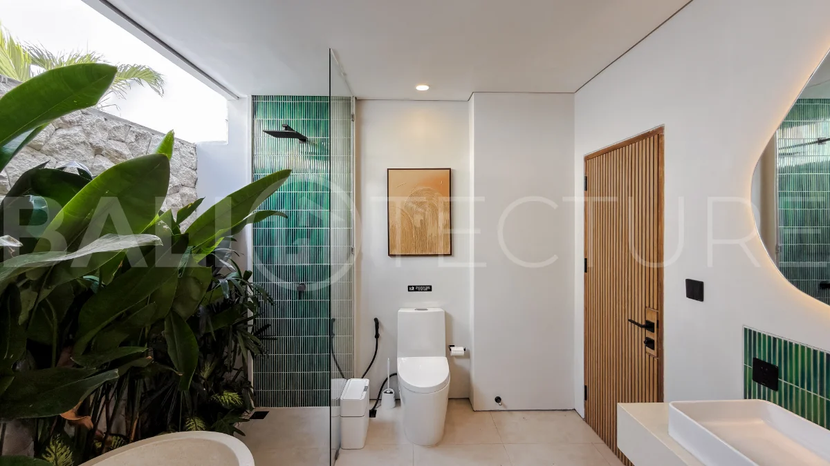 Modern tropical luxury villa at Solas Villas in Bingin, Bali, featuring contemporary architecture, stylish interiors, a private infinity pool, and a rooftop terrace with panoramic ocean views. Surrounded by lush tropical scenery, the villa offers a sophisticated coastal lifestyle with high-quality finishes and functional living spaces. Scheduled for completion in late 2025, this exclusive property is located in one of Bali's most desirable destinations and is eligible for buyer financing.