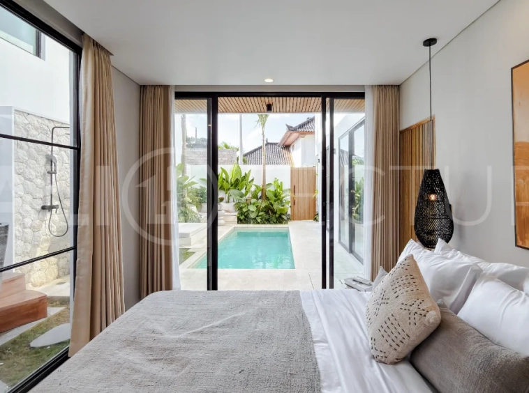 Modern tropical luxury villa at Solas Villas in Bingin, Bali, featuring contemporary architecture, stylish interiors, a private infinity pool, and a rooftop terrace with panoramic ocean views. Surrounded by lush tropical scenery, the villa offers a sophisticated coastal lifestyle with high-quality finishes and functional living spaces. Scheduled for completion in late 2025, this exclusive property is located in one of Bali's most desirable destinations and is eligible for buyer financing.