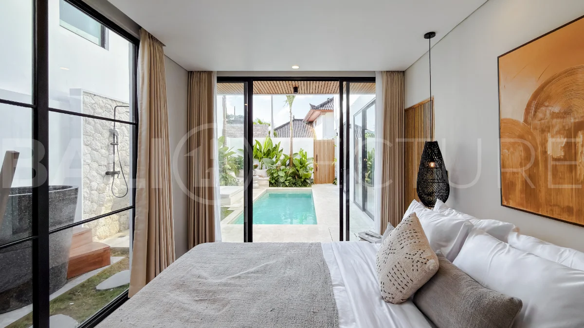 Modern tropical luxury villa at Solas Villas in Bingin, Bali, featuring contemporary architecture, stylish interiors, a private infinity pool, and a rooftop terrace with panoramic ocean views. Surrounded by lush tropical scenery, the villa offers a sophisticated coastal lifestyle with high-quality finishes and functional living spaces. Scheduled for completion in late 2025, this exclusive property is located in one of Bali's most desirable destinations and is eligible for buyer financing.
