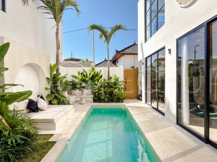 Modern tropical luxury villa at Solas Villas in Bingin, Bali, featuring contemporary architecture, stylish interiors, a private infinity pool, and a rooftop terrace with panoramic ocean views. Surrounded by lush tropical scenery, the villa offers a sophisticated coastal lifestyle with high-quality finishes and functional living spaces. Scheduled for completion in late 2025, this exclusive property is located in one of Bali's most desirable destinations and is eligible for buyer financing.
