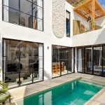 Modern tropical luxury villa at Solas Villas in Bingin, Bali, featuring contemporary architecture, stylish interiors, a private infinity pool, and a rooftop terrace with panoramic ocean views. Surrounded by lush tropical scenery, the villa offers a sophisticated coastal lifestyle with high-quality finishes and functional living spaces. Scheduled for completion in late 2025, this exclusive property is located in one of Bali's most desirable destinations and is eligible for buyer financing.