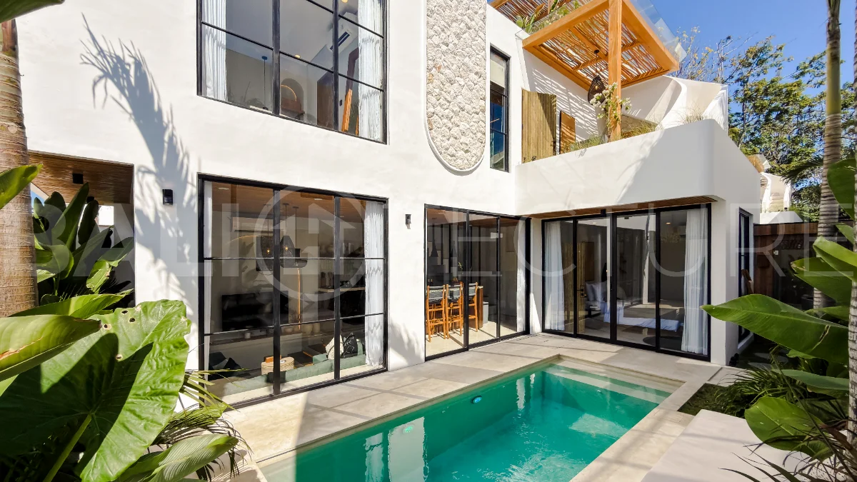 Modern tropical luxury villa at Solas Villas in Bingin, Bali, featuring contemporary architecture, stylish interiors, a private infinity pool, and a rooftop terrace with panoramic ocean views. Surrounded by lush tropical scenery, the villa offers a sophisticated coastal lifestyle with high-quality finishes and functional living spaces. Scheduled for completion in late 2025, this exclusive property is located in one of Bali's most desirable destinations and is eligible for buyer financing.
