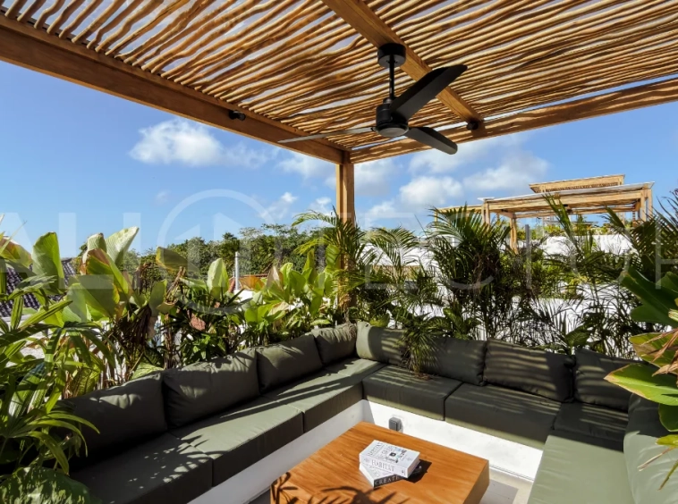 Modern tropical luxury villa at Solas Villas in Bingin, Bali, featuring contemporary architecture, stylish interiors, a private infinity pool, and a rooftop terrace with panoramic ocean views. Surrounded by lush tropical scenery, the villa offers a sophisticated coastal lifestyle with high-quality finishes and functional living spaces. Scheduled for completion in late 2025, this exclusive property is located in one of Bali's most desirable destinations and is eligible for buyer financing.