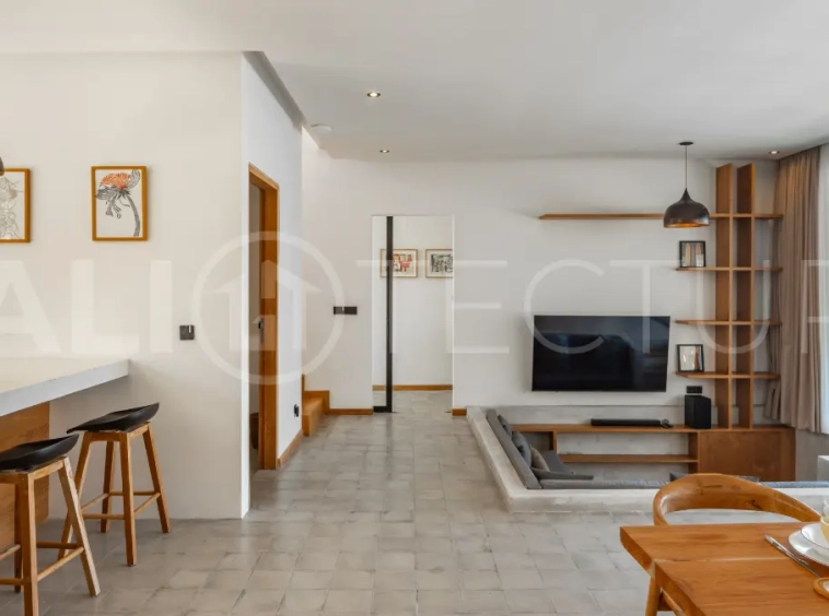 Luxury 3-bedroom ocean-view villa in Pecatu, Uluwatu, Bali, featuring a private pool, tropical Zen garden, rooftop terrace, modern interiors, and panoramic sunset views.