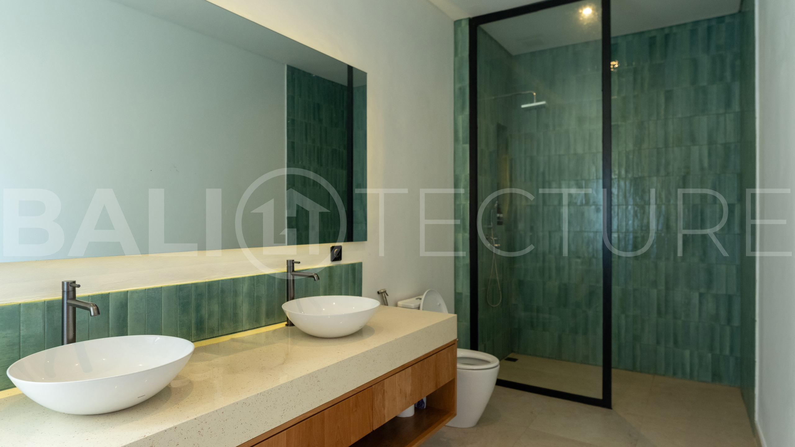 Luxury 3-bedroom ocean-view villa in Pecatu, Uluwatu, Bali, featuring a private pool, tropical Zen garden, rooftop terrace, modern interiors, and panoramic sunset views.