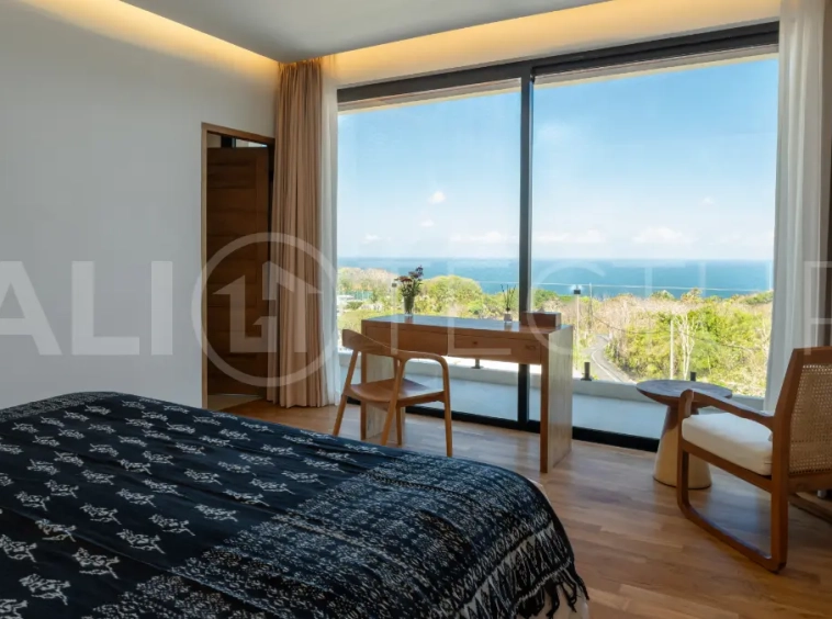 Luxury 3-bedroom ocean-view villa in Pecatu, Uluwatu, Bali, featuring a private pool, tropical Zen garden, rooftop terrace, modern interiors, and panoramic sunset views.