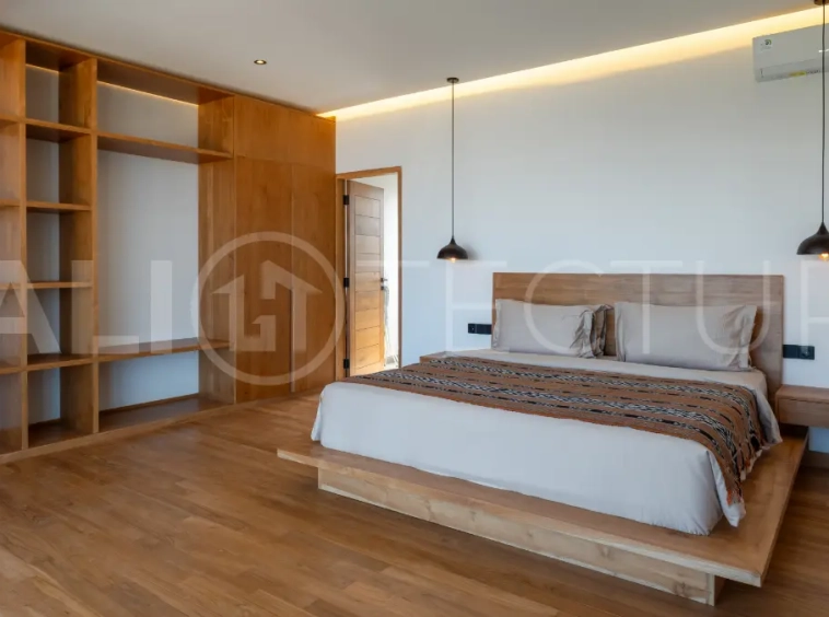 Luxury 3-bedroom ocean-view villa in Pecatu, Uluwatu, Bali, featuring a private pool, tropical Zen garden, rooftop terrace, modern interiors, and panoramic sunset views.