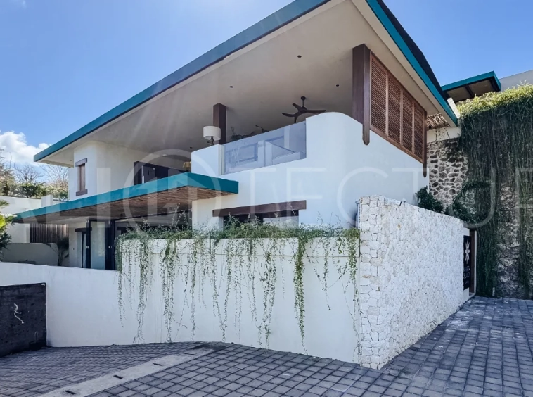 Brand new 3-bedroom tropical villa in Pecatu, Uluwatu featuring contemporary architecture, elegant natural finishes, and panoramic ocean views. The property includes three ensuite bedrooms, an enclosed living and dining area, a fully enclosed kitchen, a private 6 x 2 meter swimming pool, landscaped garden, balcony, and a rooftop terrace overlooking the ocean. Set on 204 m² of land with a 220 m² two-story building, the fully furnished villa is scheduled for completion in 2026 and is available under freehold and leasehold ownership in a prime tourism area.