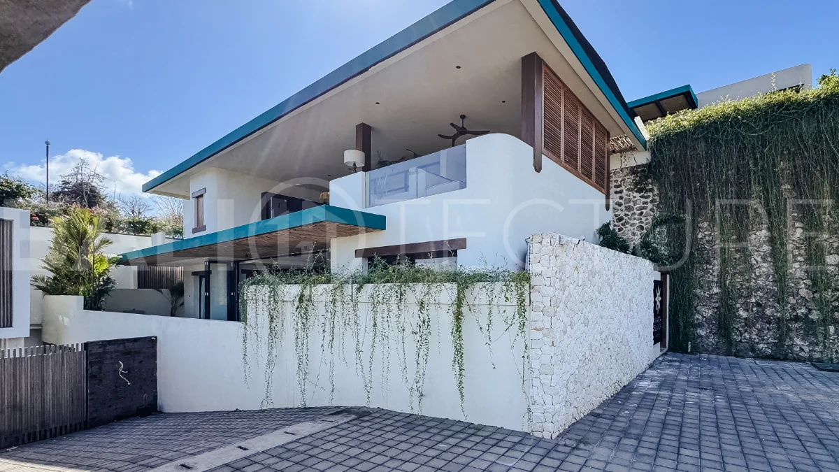 Brand new 3-bedroom tropical villa in Pecatu, Uluwatu featuring contemporary architecture, elegant natural finishes, and panoramic ocean views. The property includes three ensuite bedrooms, an enclosed living and dining area, a fully enclosed kitchen, a private 6 x 2 meter swimming pool, landscaped garden, balcony, and a rooftop terrace overlooking the ocean. Set on 204 m² of land with a 220 m² two-story building, the fully furnished villa is scheduled for completion in 2026 and is available under freehold and leasehold ownership in a prime tourism area.