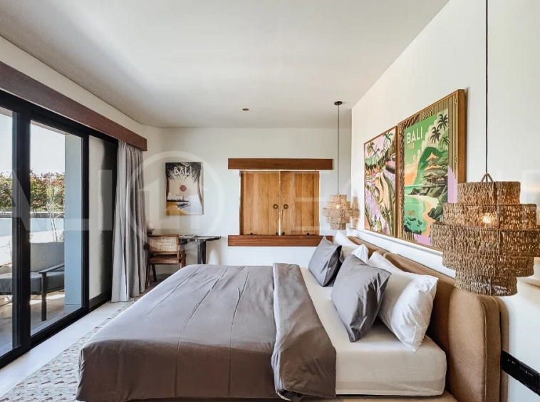 Brand new 3-bedroom tropical villa in Pecatu, Uluwatu featuring contemporary architecture, elegant natural finishes, and panoramic ocean views. The property includes three ensuite bedrooms, an enclosed living and dining area, a fully enclosed kitchen, a private 6 x 2 meter swimming pool, landscaped garden, balcony, and a rooftop terrace overlooking the ocean. Set on 204 m² of land with a 220 m² two-story building, the fully furnished villa is scheduled for completion in 2026 and is available under freehold and leasehold ownership in a prime tourism area.