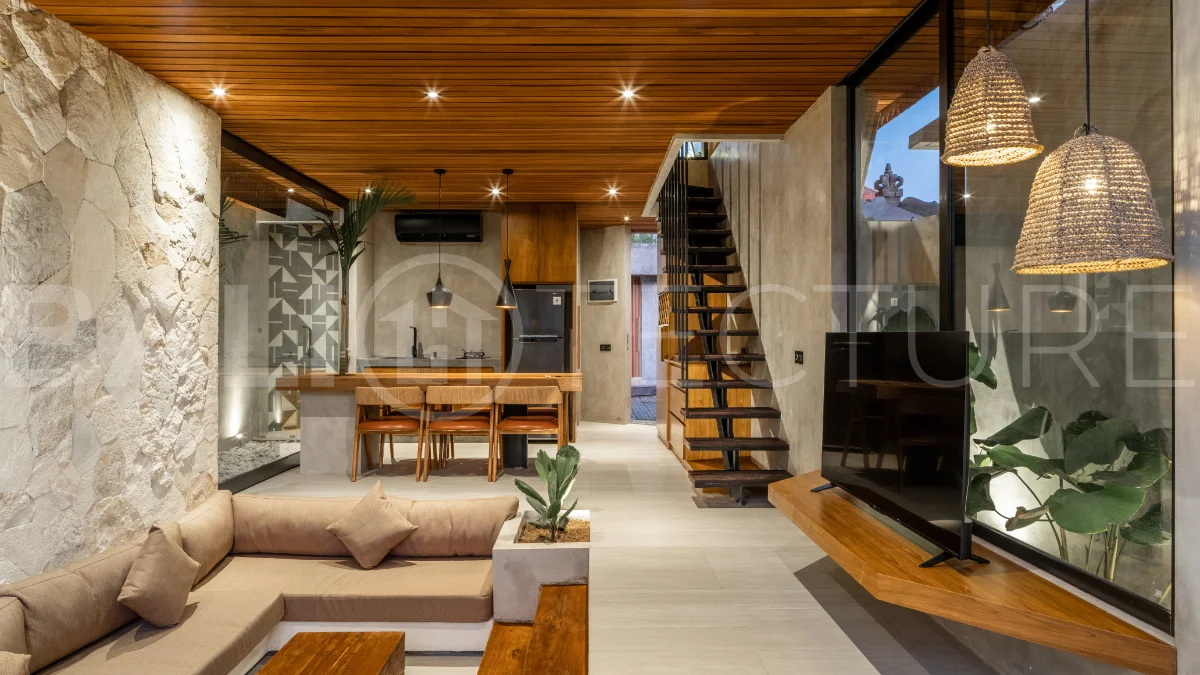 Off-plan 2-bedroom villa for sale near Bingin Beach, featuring traditional Balinese and contemporary architecture, a private 10 m² swimming pool, lush tropical surroundings, and fully furnished interiors.