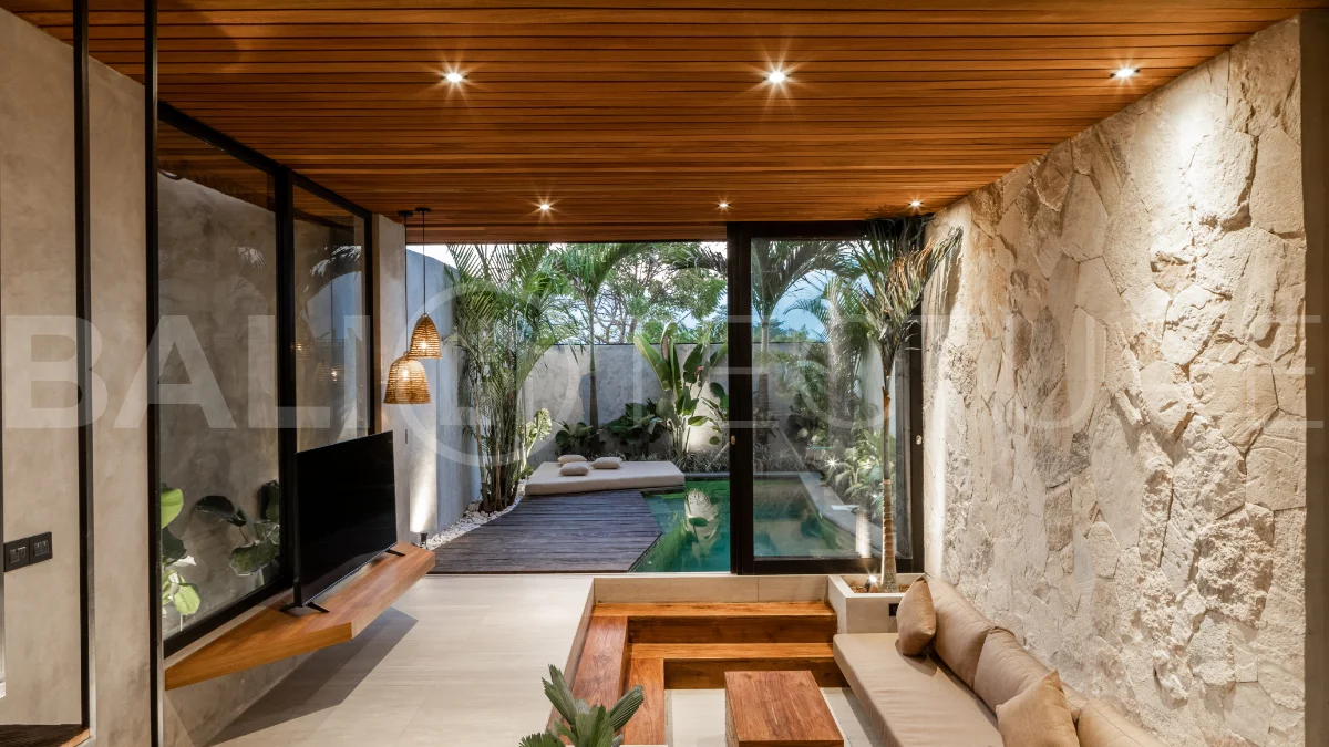 Off-plan 2-bedroom villa for sale near Bingin Beach, featuring traditional Balinese and contemporary architecture, a private 10 m² swimming pool, lush tropical surroundings, and fully furnished interiors.