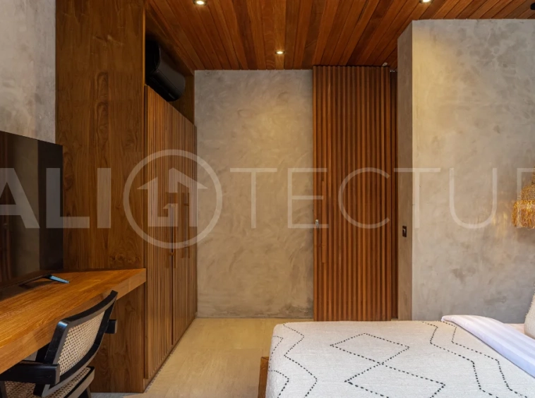 Off-plan 2-bedroom villa for sale near Bingin Beach, featuring traditional Balinese and contemporary architecture, a private 10 m² swimming pool, lush tropical surroundings, and fully furnished interiors.