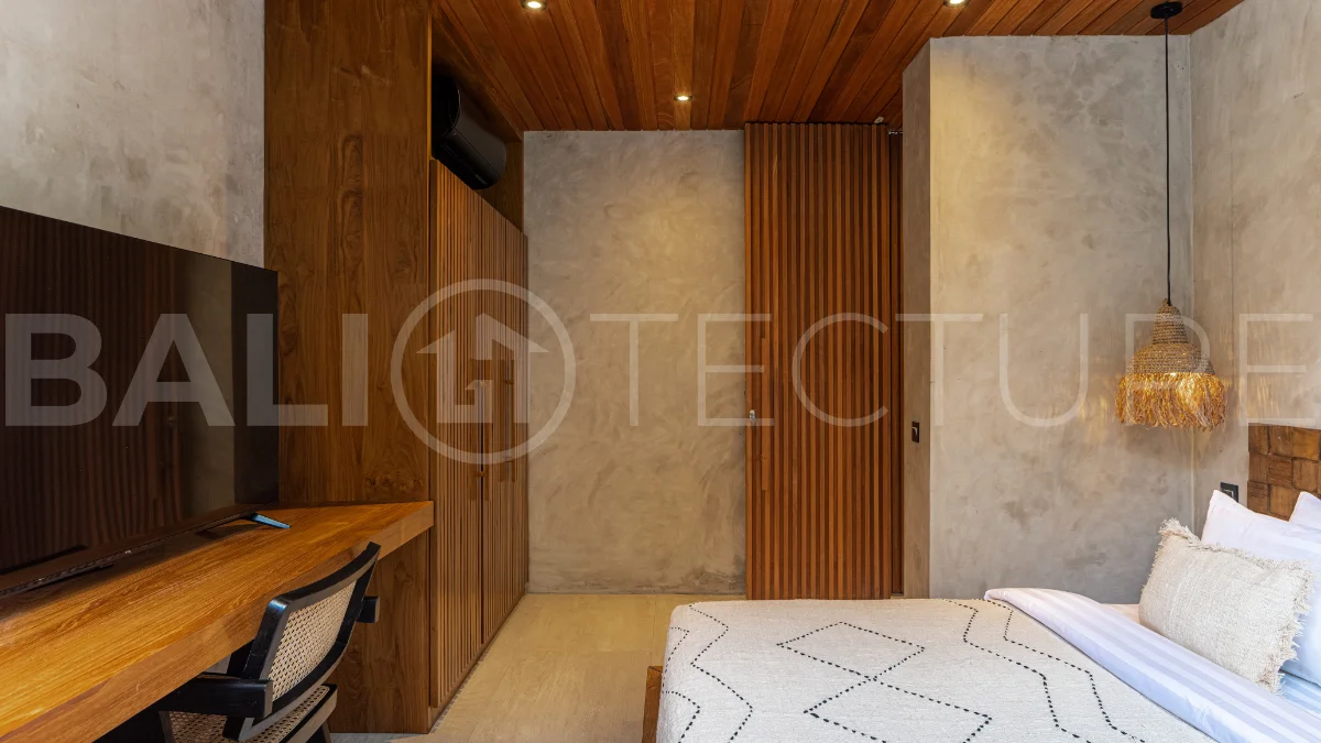 Off-plan 2-bedroom villa for sale near Bingin Beach, featuring traditional Balinese and contemporary architecture, a private 10 m² swimming pool, lush tropical surroundings, and fully furnished interiors.