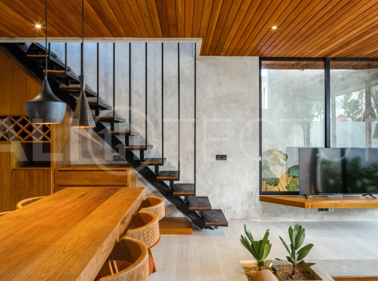 Off-plan 2-bedroom villa for sale near Bingin Beach, featuring traditional Balinese and contemporary architecture, a private 10 m² swimming pool, lush tropical surroundings, and fully furnished interiors.