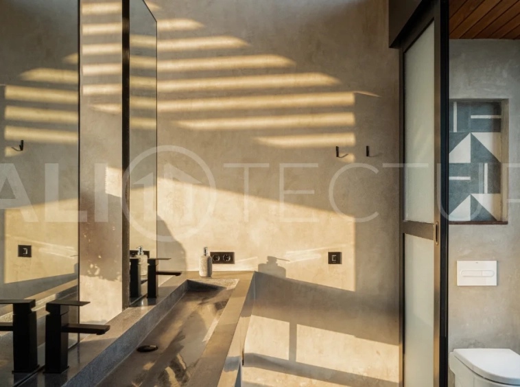 Off-plan 2-bedroom villa for sale near Bingin Beach, featuring traditional Balinese and contemporary architecture, a private 10 m² swimming pool, lush tropical surroundings, and fully furnished interiors.