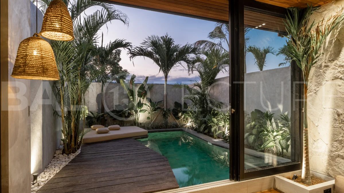 Off-plan 2-bedroom villa for sale near Bingin Beach, featuring traditional Balinese and contemporary architecture, a private 10 m² swimming pool, lush tropical surroundings, and fully furnished interiors.
