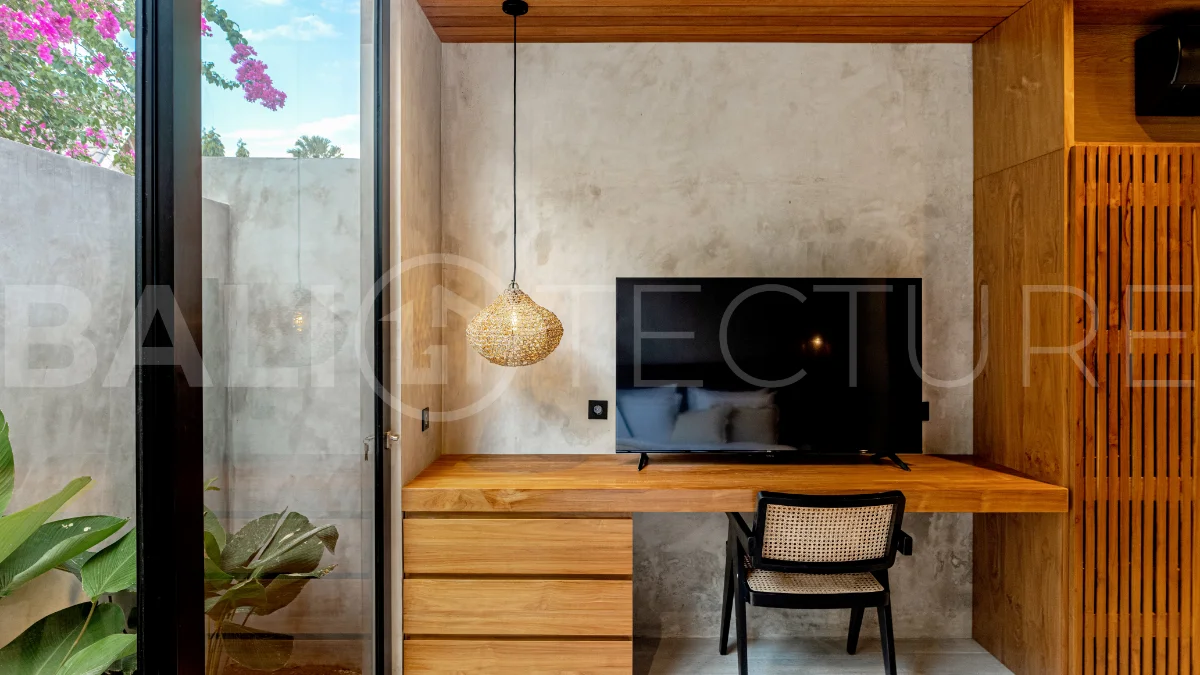 Off-plan 2-bedroom villa for sale near Bingin Beach, featuring traditional Balinese and contemporary architecture, a private 10 m² swimming pool, lush tropical surroundings, and fully furnished interiors.