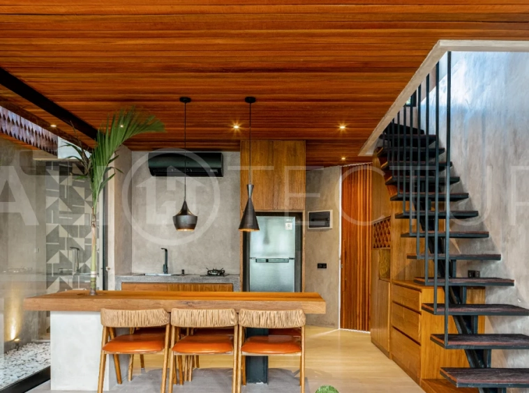 Off-plan 2-bedroom villa for sale near Bingin Beach, featuring traditional Balinese and contemporary architecture, a private 10 m² swimming pool, lush tropical surroundings, and fully furnished interiors.