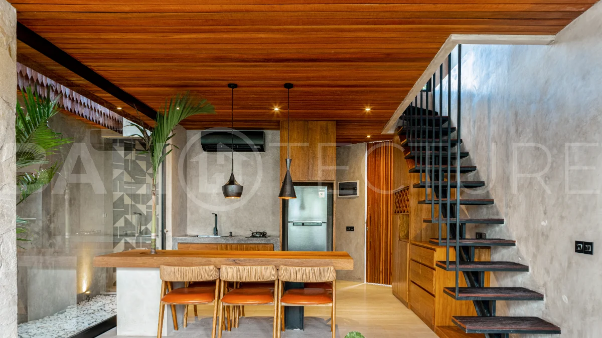 Off-plan 2-bedroom villa for sale near Bingin Beach, featuring traditional Balinese and contemporary architecture, a private 10 m² swimming pool, lush tropical surroundings, and fully furnished interiors.