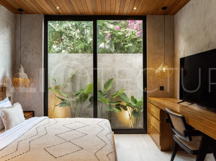 Off-plan 2-bedroom villa for sale near Bingin Beach, featuring traditional Balinese and contemporary architecture, a private 10 m² swimming pool, lush tropical surroundings, and fully furnished interiors.