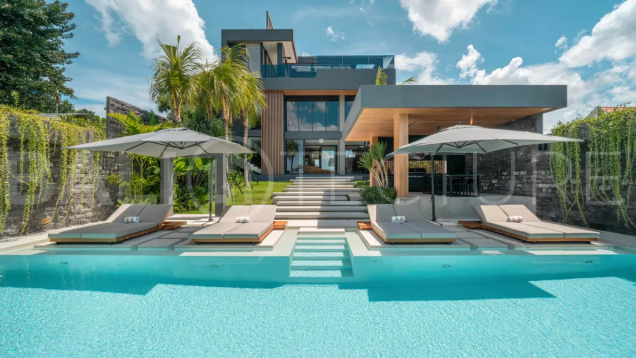 Luxury four bedroom leasehold villa in Canggu, Bali, featuring a private garden, 45sqm swimming pool, spacious living area, modern kitchen, outdoor terrace, jacuzzi, and premium entertainment amenities.