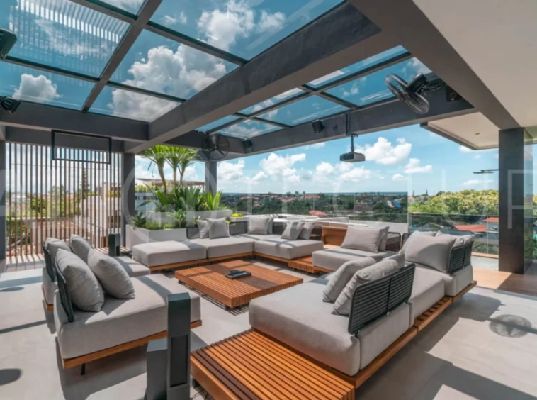 Luxury four bedroom leasehold villa in Canggu, Bali, featuring a private garden, 45sqm swimming pool, spacious living area, modern kitchen, outdoor terrace, jacuzzi, and premium entertainment amenities.
