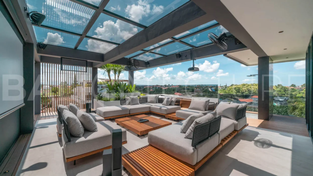 Luxury four bedroom leasehold villa in Canggu, Bali, featuring a private garden, 45sqm swimming pool, spacious living area, modern kitchen, outdoor terrace, jacuzzi, and premium entertainment amenities.